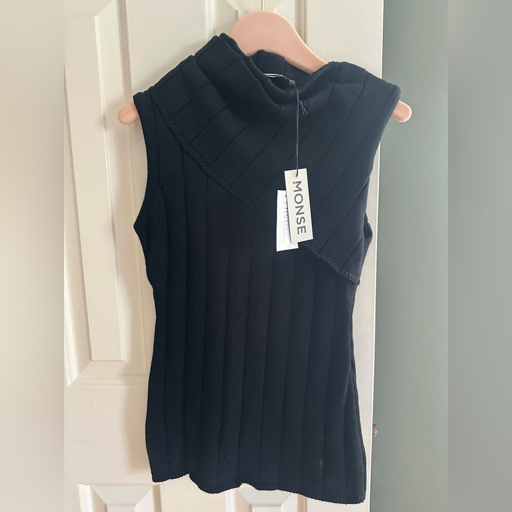 MONSE FOLD-OVER RIB KNIT COTTON TOP
Black Ribbed Sleeveless Turtleneck Sweater